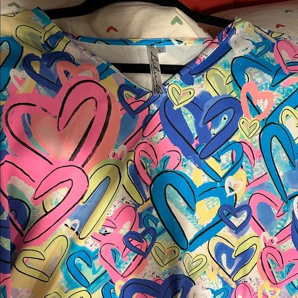 LuLu B Heart Print Top in Pink, Blue, Yellow, Teal. - Picture 4 of 4